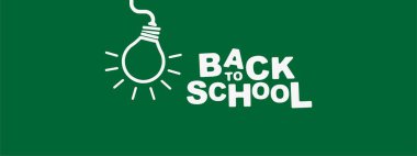 Back to school sign on green background