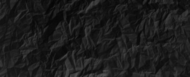 Buruşmuş kağıtlarla kaplanmış yaratıcı bir arka plan..