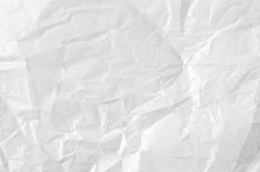 Buruşmuş kağıtlarla kaplanmış yaratıcı bir arka plan..