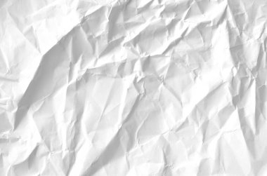 Buruşmuş kağıtlarla kaplanmış yaratıcı bir arka plan..