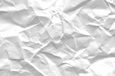 Buruşmuş kağıtlarla kaplanmış yaratıcı bir arka plan..