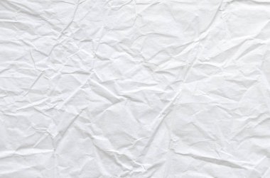 Buruşmuş kağıtlarla kaplanmış yaratıcı bir arka plan..