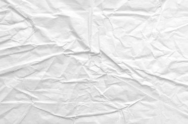 Buruşmuş kağıtlarla kaplanmış yaratıcı bir arka plan..