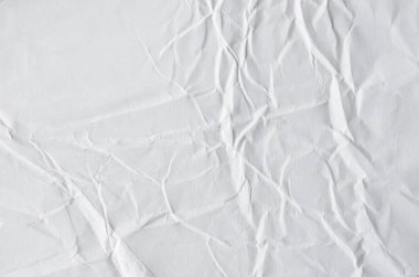 Buruşmuş kağıtlarla kaplanmış yaratıcı bir arka plan..