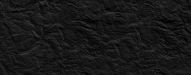 Buruşmuş kağıtlarla kaplanmış yaratıcı bir arka plan..