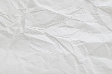 Buruşmuş kağıtlarla kaplanmış yaratıcı bir arka plan..