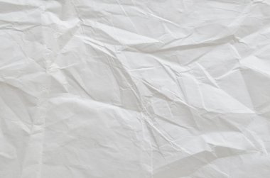 Buruşmuş kağıtlarla kaplanmış yaratıcı bir arka plan..