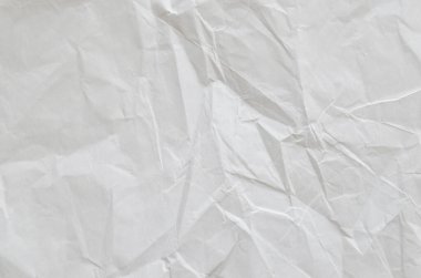 Buruşmuş kağıtlarla kaplanmış yaratıcı bir arka plan..