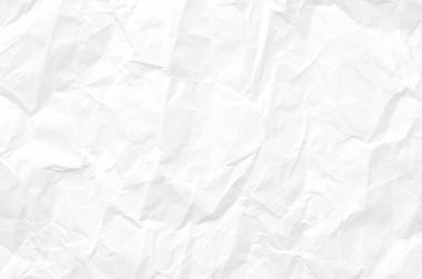 Buruşmuş kağıtlarla kaplanmış yaratıcı bir arka plan..