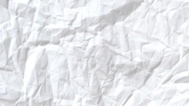 Buruşmuş kağıtlarla kaplanmış yaratıcı bir arka plan..