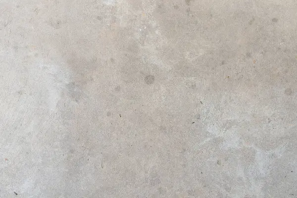 Gri beton duvarın fotoğrafı. Beton doku. Arka plan için mükemmel.