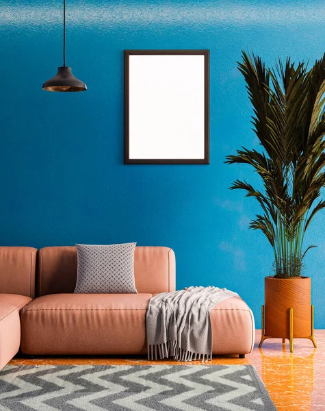 Mavi duvarda asılı boş fotoğraf çerçevesi modeli.
