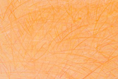 kağıt arka plan dokusu üzerinde turuncu boya kalemleri doodle