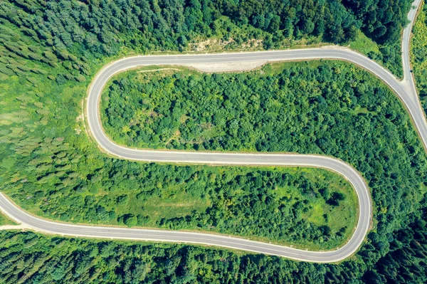 Top view of a mountain winding road in summer. Carpathian mountains. Ukraine