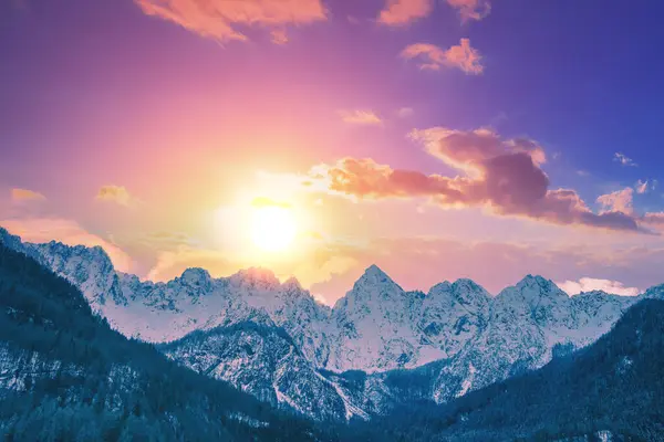 stock image View of the Alps in Gozd Martuljek at sunrise. The tops of the mountains are covered with snow. Triglav national park. Slovenia, Europe