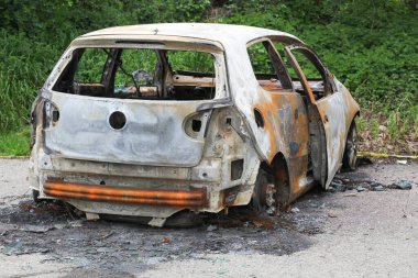Burnt out car in France