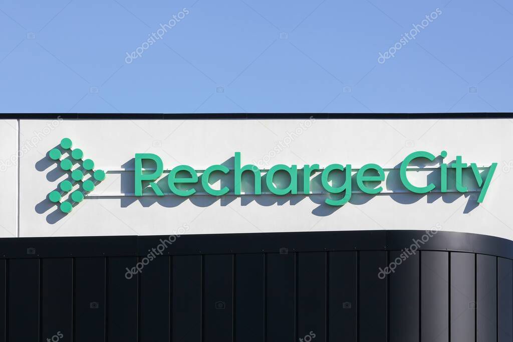 Horsens, Denmark - March 15, 2025: Recharge City logo on a wall. Recharge City becomes the first and largest parking and recharging center with EU platin certification placed in the heart of Denmark