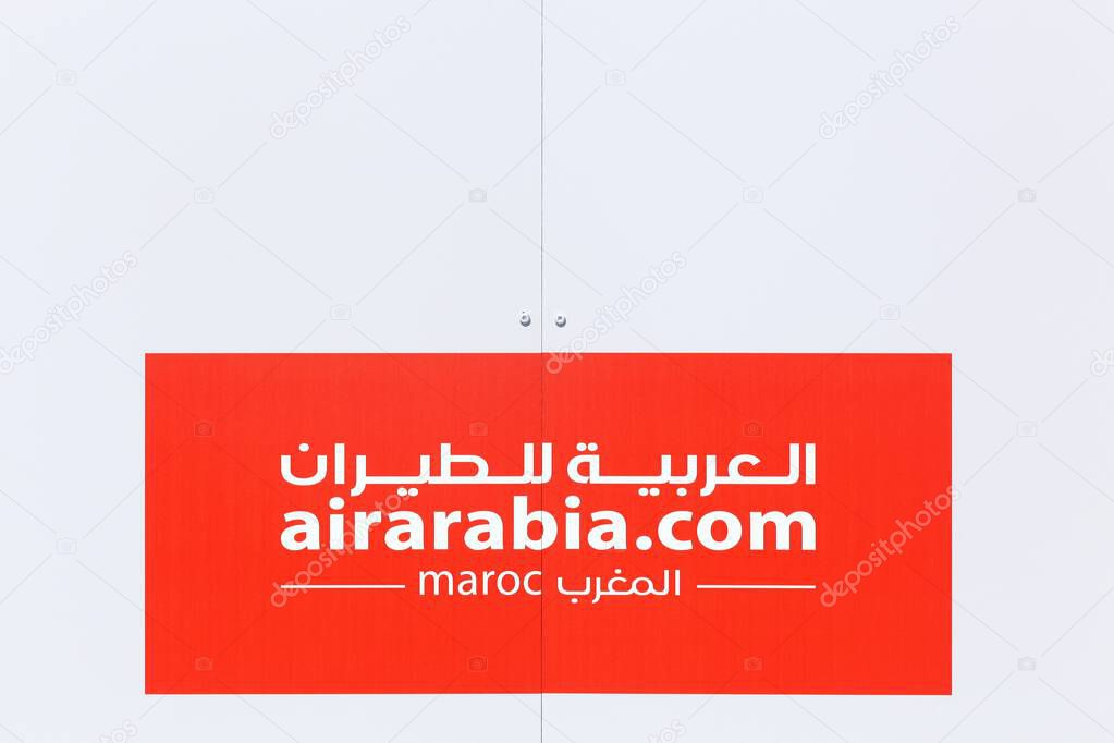 Lyon, France - May 27, 2017: Air Arabia logo on a wall. Air Arabia is an Emirati low-cost airline with its head office at Sharjah international airport, United Arab Emirates