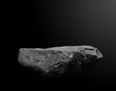Stone podium on dark black background.	