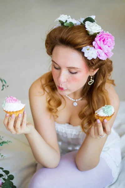 beautiful young woman with a cake