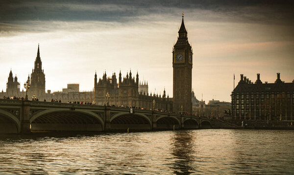 Big Ben, Westminster Bridge stylized as old vintage photo. Toned image.
