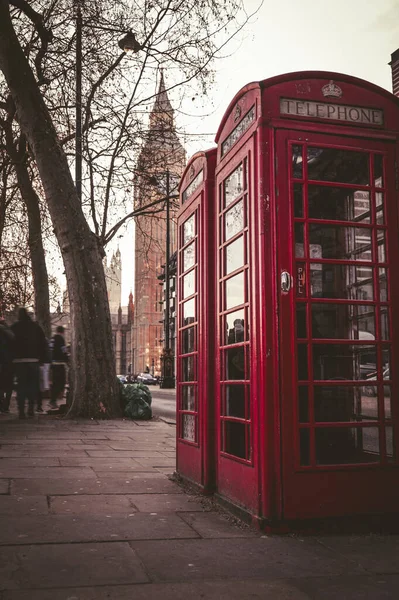 stock image Classic English Red telephone booth. Autumn.