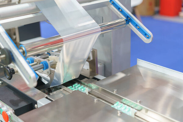 фармацевтическая машина для упаковки пузырьков, предназначенная для упаковки таблеток и капсул.