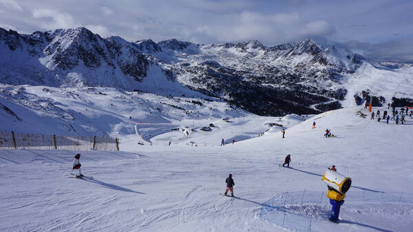 Grandvalira, Andorra, December 6, 2022: images of an artificial snow cannon in a ski resort in Andorra.