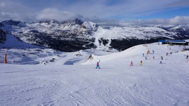 Pyrenees, Andorra, December 06, 2022: images of skiing in a snow station.