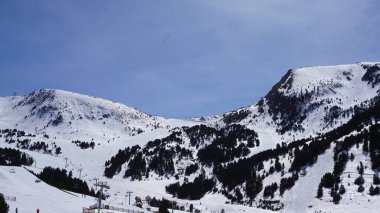 Andorra, April, 10, 2022: Ski landscape in spring in a resort in the Pyrenees
