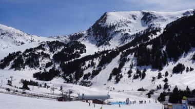 Andorra, April, 10, 2022: Ski landscape in spring in a resort in the Pyrenees