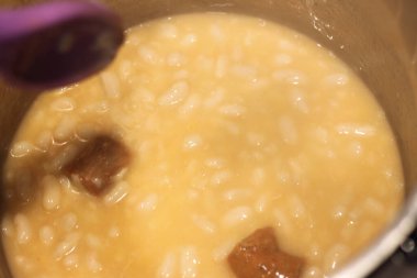 white bean stew with chorizo in a pot