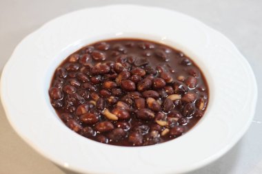 red bean stew on a white plate