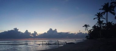 29 Ağustos 2023 'te Uvero Alto, Punta Cana, Dominik Cumhuriyeti' nde bir Karayip sahilinde güzel bir gün doğumu.