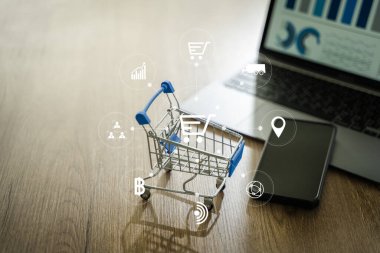 e-commerce marketing online shopping on a laptop Shopping and credit card payments for banking online, paper boxes