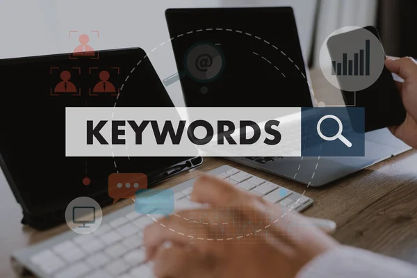 keywords on a website for content businessman Search keywords on a laptop, browse in the office, optimize SEO engine communication on the computer, find data analysis, and advertise on the internet.