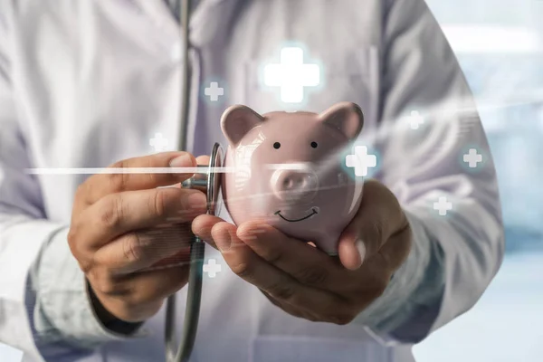 Doctors medical saving money on health care insurance to insurance plan finance Piggy bank money