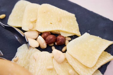 Portuguese cheese. Plate with pieces of cheese from Sierra de la Estrella