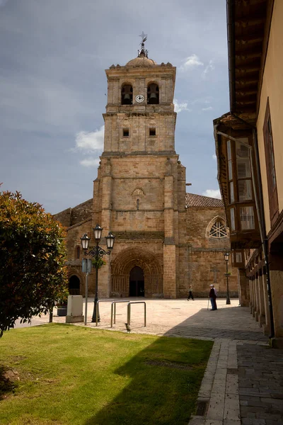 stock image Aguilar de Campo (Spain), June 14, 2023. Collegiate Church of San Miguel. It is a Historical-Artistic Monument since 1931, built in the Gothic style in the 14th century.