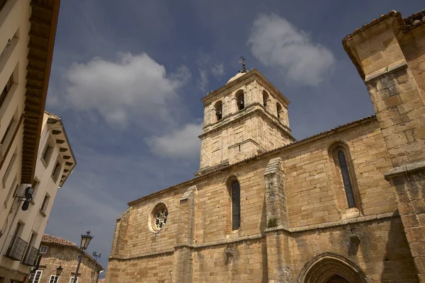 stock image Aguilar de Campo (Spain), June 14, 2023. Collegiate Church of San Miguel. It is a Historical-Artistic Monument since 1931, built in the Gothic style in the 14th century.