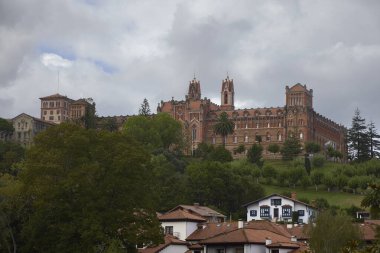 Comillas (Cantabria, Spain), August 27, 2023. Pontifical University. It was created by the Marquis of Comillas to provide education to young people in the population without resources. Later it was a seminary for priests clipart