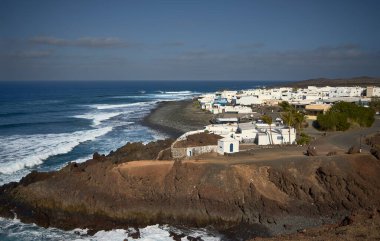 El Golfo (Spain), 22 January 2024. General view of the village. This village is known for its green lake, a pocket of greenish water inside a volcanic crater. clipart
