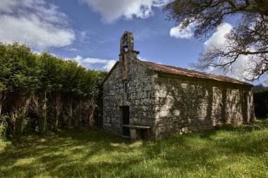 Valga (Spain), April 9, 2024. Chapel of San Mamede. It is in the parish of marters. It was built in the 5th centuries. In this place there were a Roman Ara of the first century dedicated to the god Mercury and medieval graves clipart