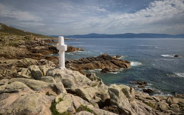 Remembering the sailors. Crosses in homage to the shellfish harvesters and sailors who died at Punta do Roncudo, on the Costa de la Muerte, in Galicia (Spain). clipart