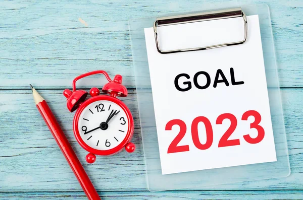 Goal 2023, Goal and Target Setting List for 2023 year with alarm clock. Change and determination concept.