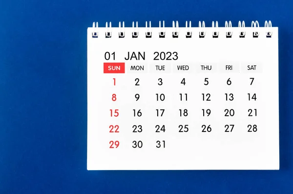 stock image January 2023 Monthly desk calendar for 2023 year on blue background.