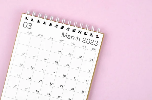 March 2023 calendar desk for the organizer to plan and reminder isolated on pink background.
