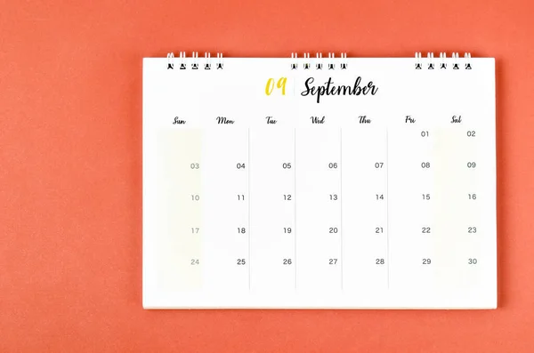 September 2023 calendar desk for the organizer to plan and reminder on red background.