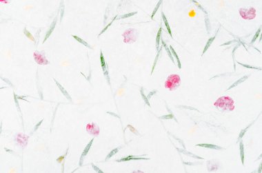Mulberry paper sheet decorated with dry flower and leaf texture background