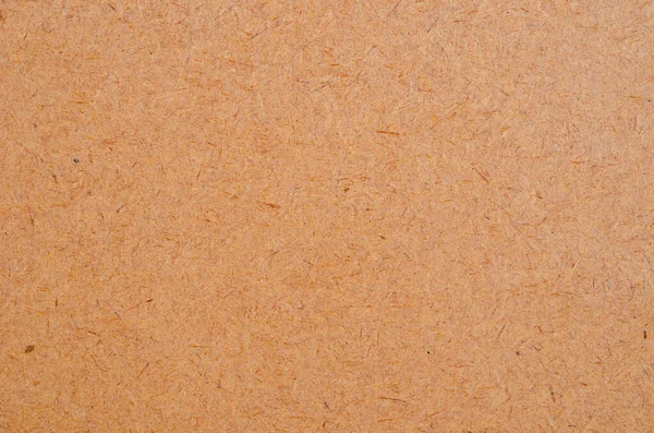 背景としての茶色のチップボード表面の質感 — ストック写真